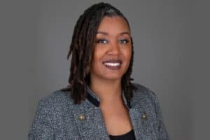 Confident, professional personal brand headshot image of a powerful woman.