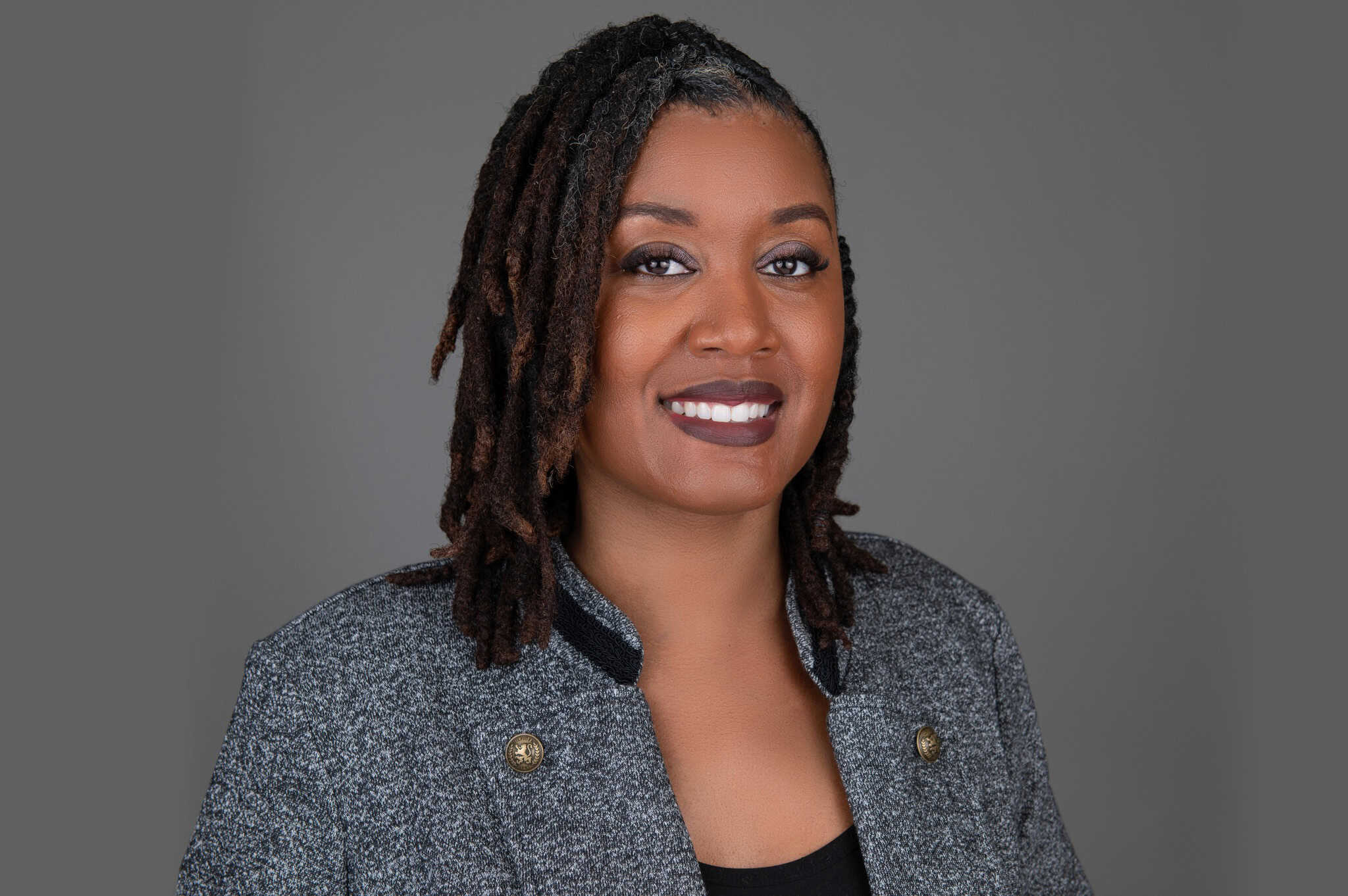 Confident, professional personal brand headshot image of a powerful woman.