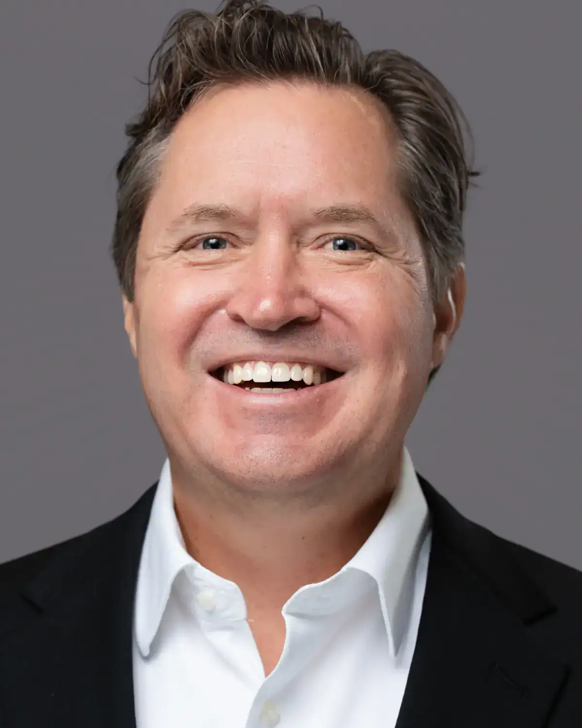 Corporate headshots Orlando — mobile studio setup at conference venue with professional lighting and seamless backdrops