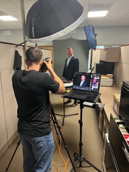 corporate headshot day St. Petersburg on-site mobile studio setup by James Connell