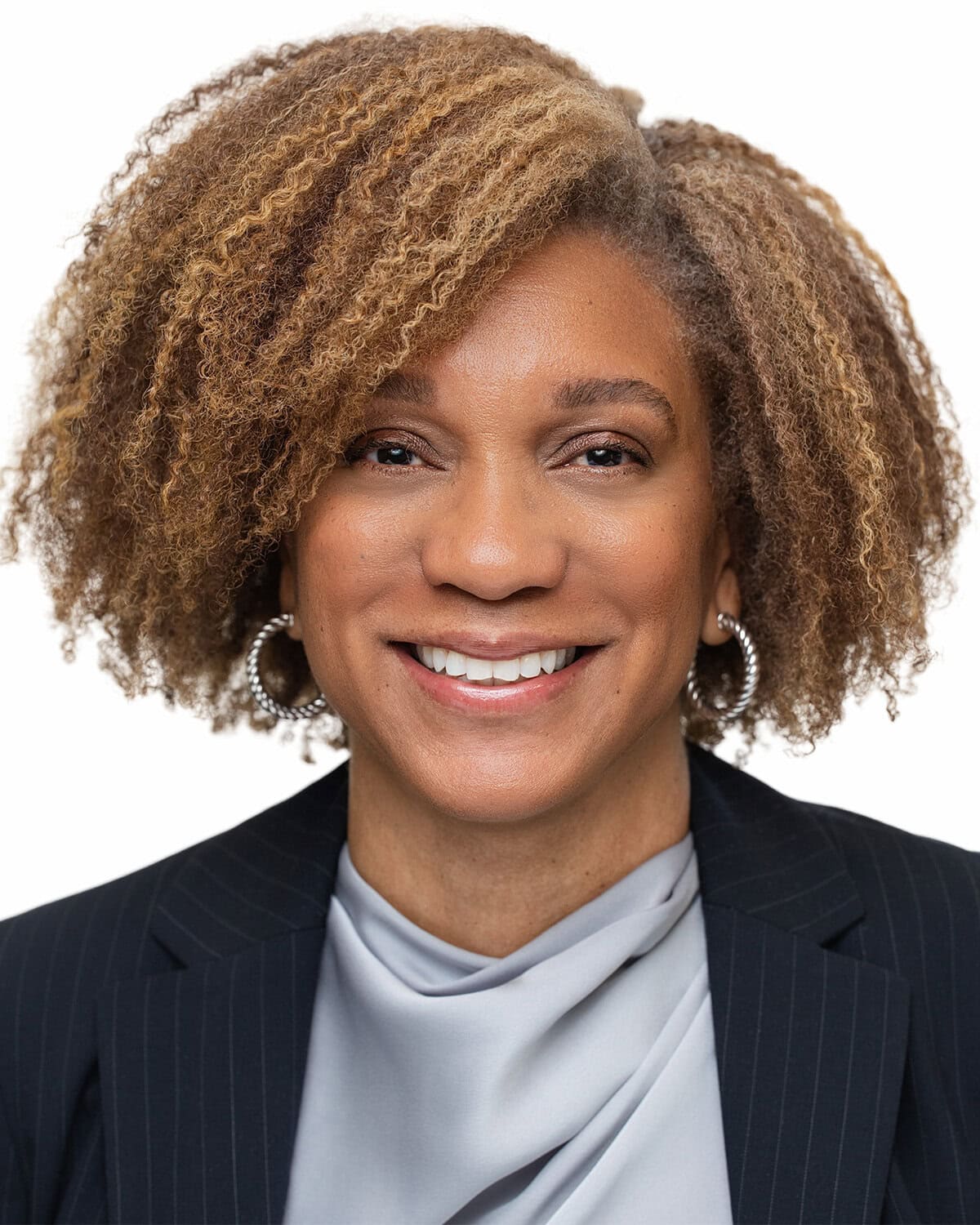 A confident personal branding portrait of a professional woman, captured during a full individual headshot session at James Connell's studio serving Lakeland clients.