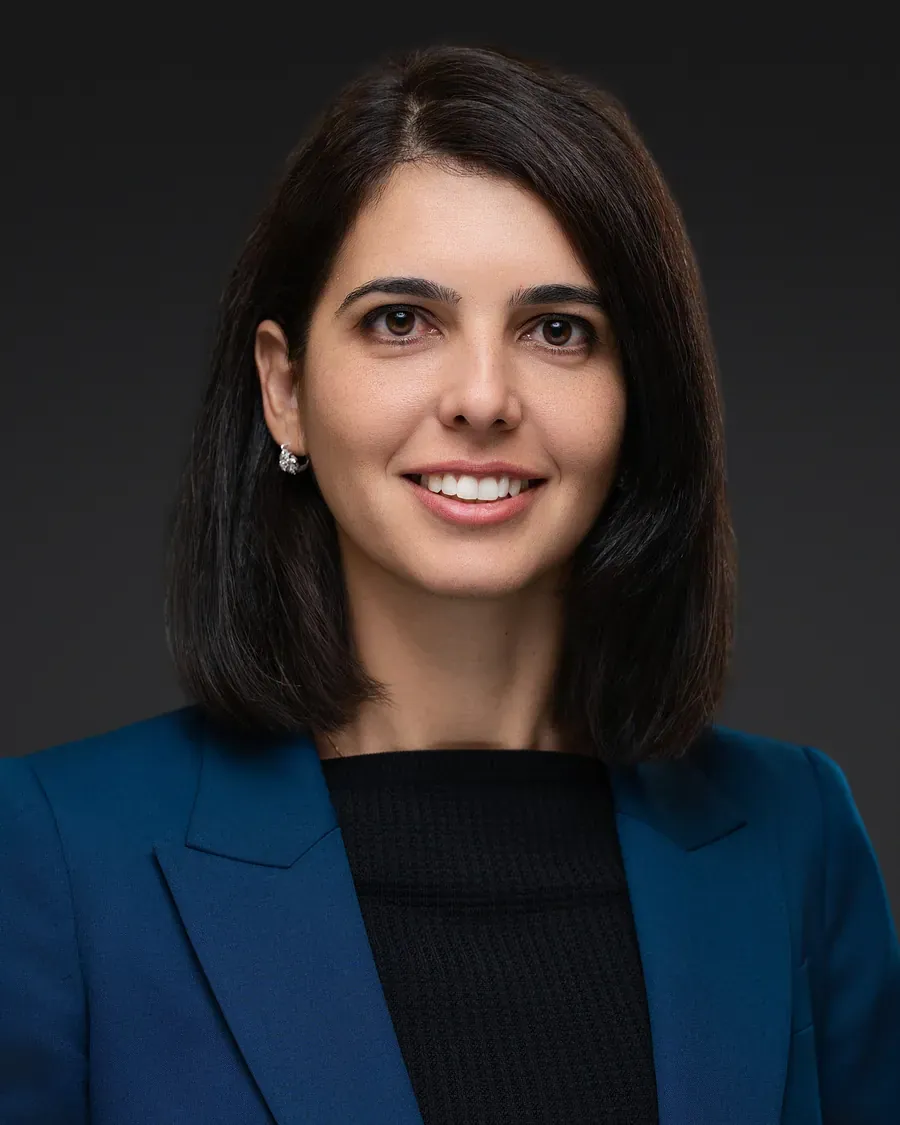 Business headshot of a professional woman in a blue blazer, Tampa