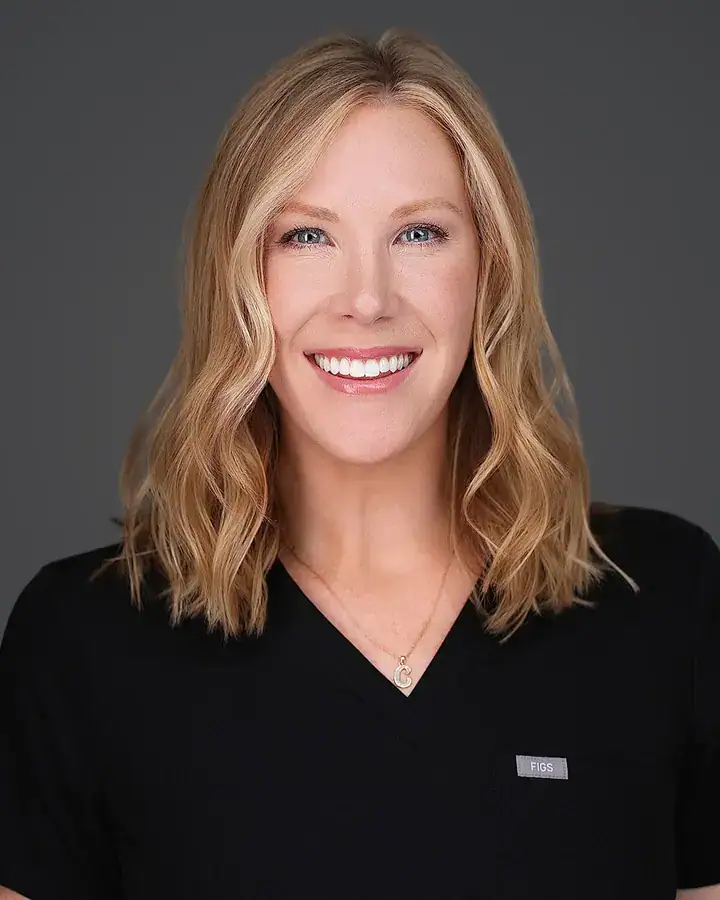 Tampa healthcare professional headshot on a gray backdrop