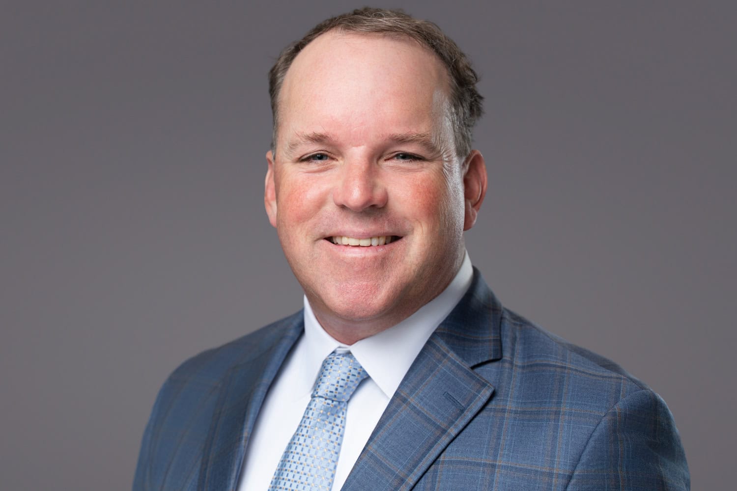 Confident professional portrait demonstrating you are your personal brand
