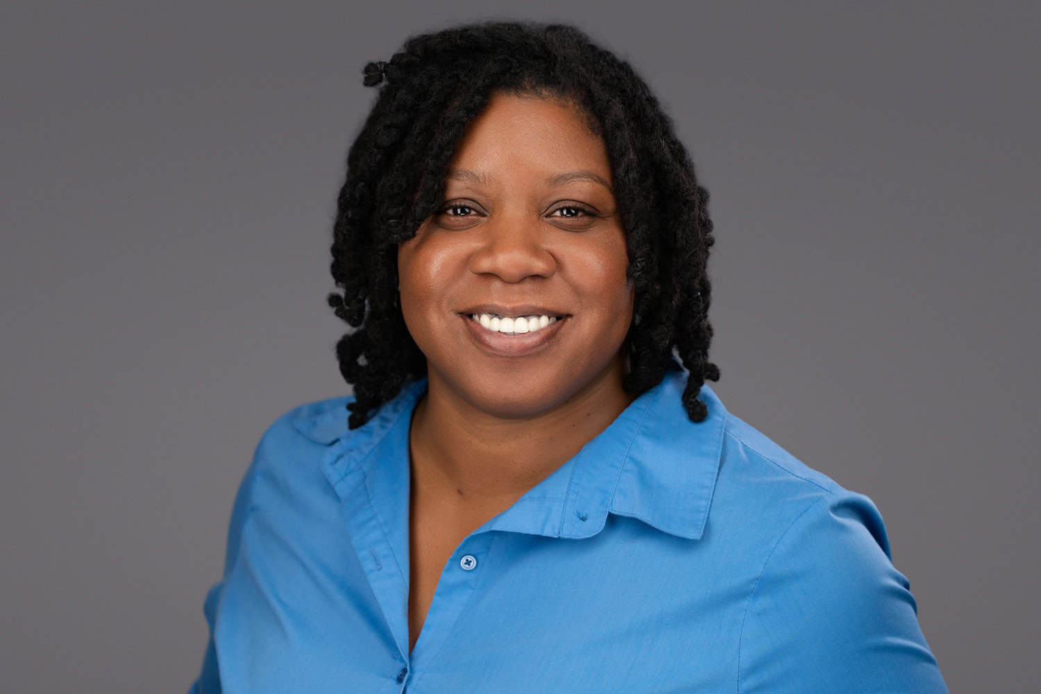 Studio portrait of a woman showing you are your personal brand